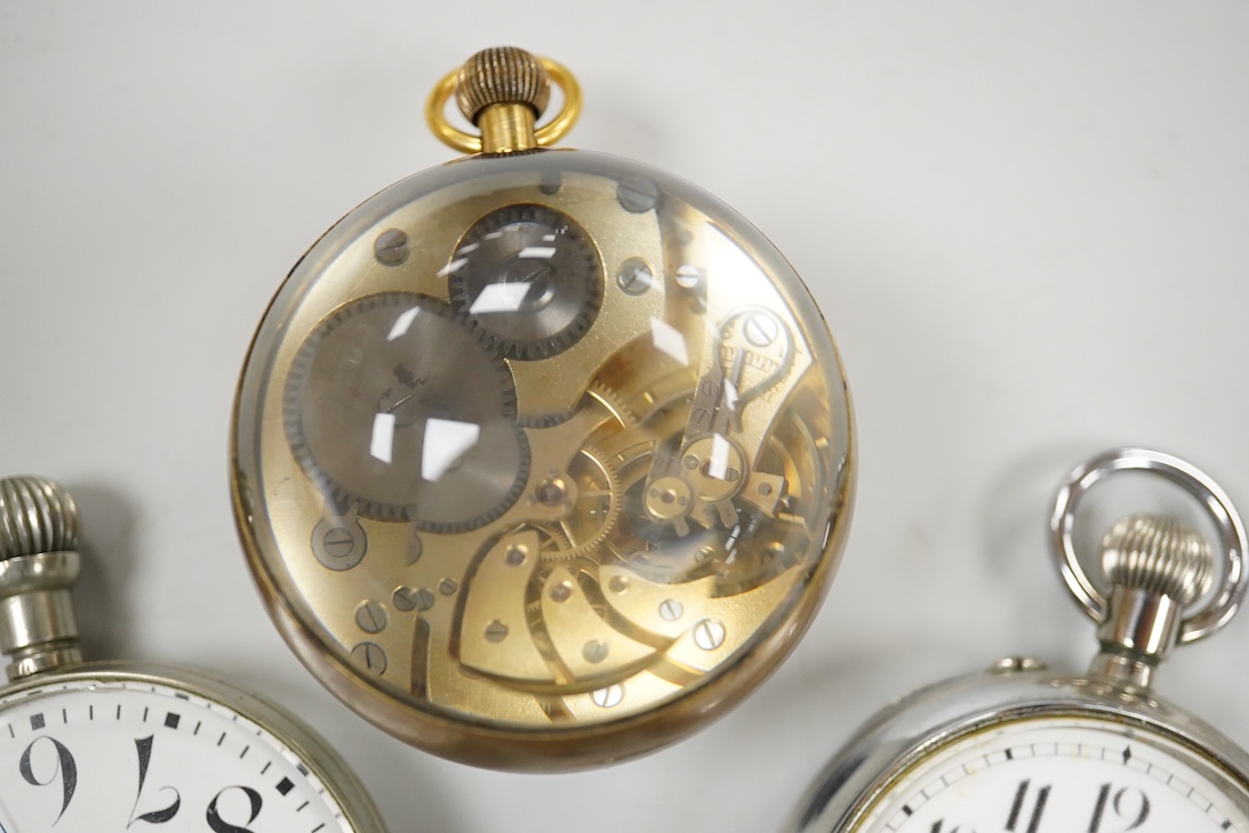 An erotic globe watch, a base metal open faced 8 day keyless pocket watch and two car dashboard clocks including Glo-Worm, largest case diameter 66mm.